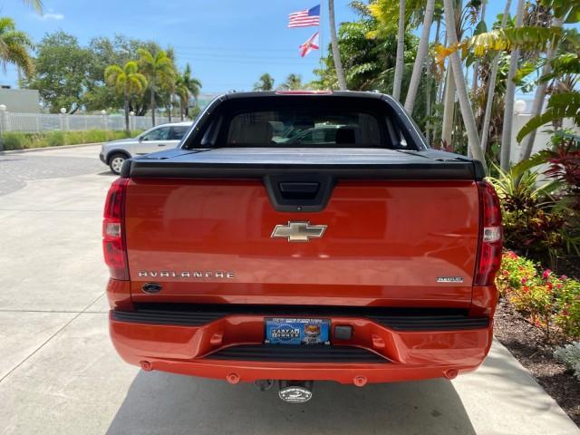 2009 Inferno Orange Metallic /Dark Cashmere/Light Cashmere Chevrolet Avalanche LT PU LOW MILES 58,696 (3GNEC22009G) with an 5.3L Vortec 1000 V8 SFI Flex-Fuel Engine engine, Automatic transmission, located at 4701 North Dixie Hwy, Pompano Beach, FL, 33064, (954) 422-2889, 26.240938, -80.123474 - OUR WEBPAGE FLORIDACARS1.COM HAS OVER 100 PHOTOS AND FREE CARFAX LINK 2009 Chevrolet Avalanche LT Sport Pickup 5.3L V8 F OHV 16V Flex Fuel 20 MPG Rear Wheel Drive Features 20 Inch Plus Wheels ABS Brakes Air Conditioning Alloy Wheels AM/FM Stereo Automatic Transmission Auxiliary Audio Input Bed Cover- Photo#94