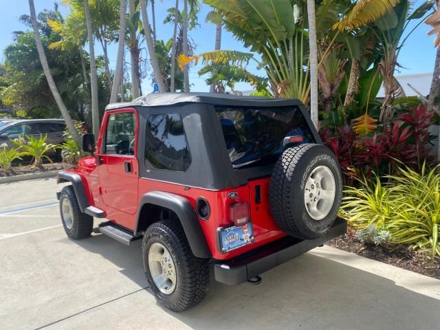 1999 Flame Red /Agate Jeep Wrangler Sport AUTO AC 4.0 6 CYL LOW MILES 92,727 (1J4FY19S2XP) with an 4.0L SMPI I6 Power Tech Engine engine, Automatic transmission, located at 4701 North Dixie Hwy, Pompano Beach, FL, 33064, (954) 422-2889, 26.240938, -80.123474 - OUR WEBPAGE FLORIDACARS1.COM HAS OVER 100 PHOTOS AND FREE CARFAX LINK 1999 Jeep Wrangler Sport 4WD Utility 4.0L I6 F Gasoline 20 MPG Rear Wheel Drive w/ 4X4 Features 4WD/AWD Air Conditioning Alloy Wheels AM/FM Stereo Automatic Transmission CD Audio Cloth Seats Cruise Control Running Boards Soft Top- Photo#5