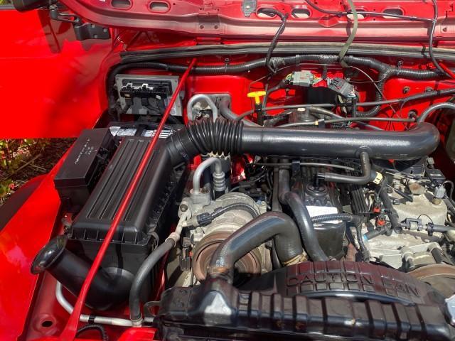 1999 Flame Red /Agate Jeep Wrangler Sport AUTO AC 4.0 6 CYL LOW MILES 92,727 (1J4FY19S2XP) with an 4.0L SMPI I6 Power Tech Engine engine, Automatic transmission, located at 4701 North Dixie Hwy, Pompano Beach, FL, 33064, (954) 422-2889, 26.240938, -80.123474 - OUR WEBPAGE FLORIDACARS1.COM HAS OVER 100 PHOTOS AND FREE CARFAX LINK 1999 Jeep Wrangler Sport 4WD Utility 4.0L I6 F Gasoline 20 MPG Rear Wheel Drive w/ 4X4 Features 4WD/AWD Air Conditioning Alloy Wheels AM/FM Stereo Automatic Transmission CD Audio Cloth Seats Cruise Control Running Boards Soft Top- Photo#24