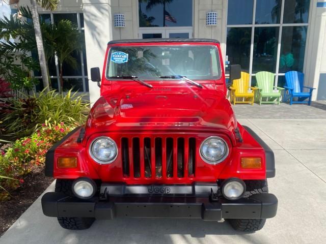 1999 Flame Red /Agate Jeep Wrangler Sport AUTO AC 4.0 6 CYL LOW MILES 92,727 (1J4FY19S2XP) with an 4.0L SMPI I6 Power Tech Engine engine, Automatic transmission, located at 4701 North Dixie Hwy, Pompano Beach, FL, 33064, (954) 422-2889, 26.240938, -80.123474 - OUR WEBPAGE FLORIDACARS1.COM HAS OVER 100 PHOTOS AND FREE CARFAX LINK 1999 Jeep Wrangler Sport 4WD Utility 4.0L I6 F Gasoline 20 MPG Rear Wheel Drive w/ 4X4 Features 4WD/AWD Air Conditioning Alloy Wheels AM/FM Stereo Automatic Transmission CD Audio Cloth Seats Cruise Control Running Boards Soft Top- Photo#27