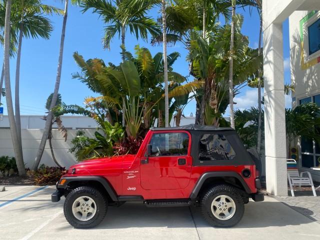 1999 Flame Red /Agate Jeep Wrangler Sport AUTO AC 4.0 6 CYL LOW MILES 92,727 (1J4FY19S2XP) with an 4.0L SMPI I6 Power Tech Engine engine, Automatic transmission, located at 4701 North Dixie Hwy, Pompano Beach, FL, 33064, (954) 422-2889, 26.240938, -80.123474 - OUR WEBPAGE FLORIDACARS1.COM HAS OVER 100 PHOTOS AND FREE CARFAX LINK 1999 Jeep Wrangler Sport 4WD Utility 4.0L I6 F Gasoline 20 MPG Rear Wheel Drive w/ 4X4 Features 4WD/AWD Air Conditioning Alloy Wheels AM/FM Stereo Automatic Transmission CD Audio Cloth Seats Cruise Control Running Boards Soft Top- Photo#30
