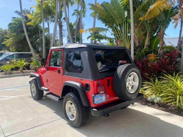 1999 Flame Red /Agate Jeep Wrangler Sport AUTO AC 4.0 6 CYL LOW MILES 92,727 (1J4FY19S2XP) with an 4.0L SMPI I6 Power Tech Engine engine, Automatic transmission, located at 4701 North Dixie Hwy, Pompano Beach, FL, 33064, (954) 422-2889, 26.240938, -80.123474 - OUR WEBPAGE FLORIDACARS1.COM HAS OVER 100 PHOTOS AND FREE CARFAX LINK 1999 Jeep Wrangler Sport 4WD Utility 4.0L I6 F Gasoline 20 MPG Rear Wheel Drive w/ 4X4 Features 4WD/AWD Air Conditioning Alloy Wheels AM/FM Stereo Automatic Transmission CD Audio Cloth Seats Cruise Control Running Boards Soft Top- Photo#32