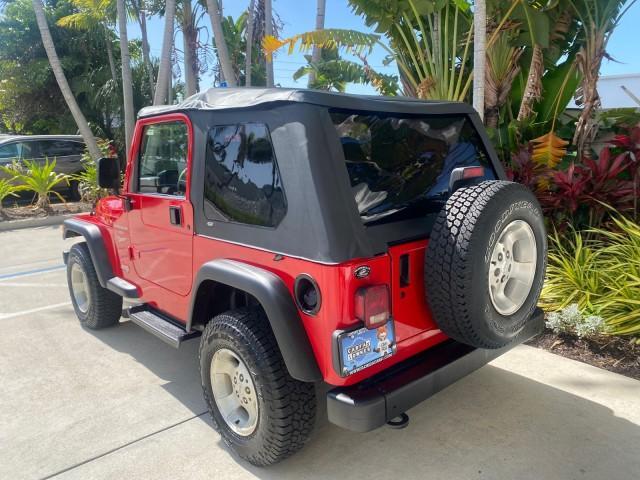 1999 Flame Red /Agate Jeep Wrangler Sport AUTO AC 4.0 6 CYL LOW MILES 92,727 (1J4FY19S2XP) with an 4.0L SMPI I6 Power Tech Engine engine, Automatic transmission, located at 4701 North Dixie Hwy, Pompano Beach, FL, 33064, (954) 422-2889, 26.240938, -80.123474 - OUR WEBPAGE FLORIDACARS1.COM HAS OVER 100 PHOTOS AND FREE CARFAX LINK 1999 Jeep Wrangler Sport 4WD Utility 4.0L I6 F Gasoline 20 MPG Rear Wheel Drive w/ 4X4 Features 4WD/AWD Air Conditioning Alloy Wheels AM/FM Stereo Automatic Transmission CD Audio Cloth Seats Cruise Control Running Boards Soft Top- Photo#33