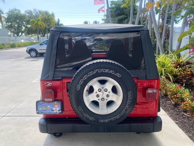 1999 Flame Red /Agate Jeep Wrangler Sport AUTO AC 4.0 6 CYL LOW MILES 92,727 (1J4FY19S2XP) with an 4.0L SMPI I6 Power Tech Engine engine, Automatic transmission, located at 4701 North Dixie Hwy, Pompano Beach, FL, 33064, (954) 422-2889, 26.240938, -80.123474 - OUR WEBPAGE FLORIDACARS1.COM HAS OVER 100 PHOTOS AND FREE CARFAX LINK 1999 Jeep Wrangler Sport 4WD Utility 4.0L I6 F Gasoline 20 MPG Rear Wheel Drive w/ 4X4 Features 4WD/AWD Air Conditioning Alloy Wheels AM/FM Stereo Automatic Transmission CD Audio Cloth Seats Cruise Control Running Boards Soft Top- Photo#35