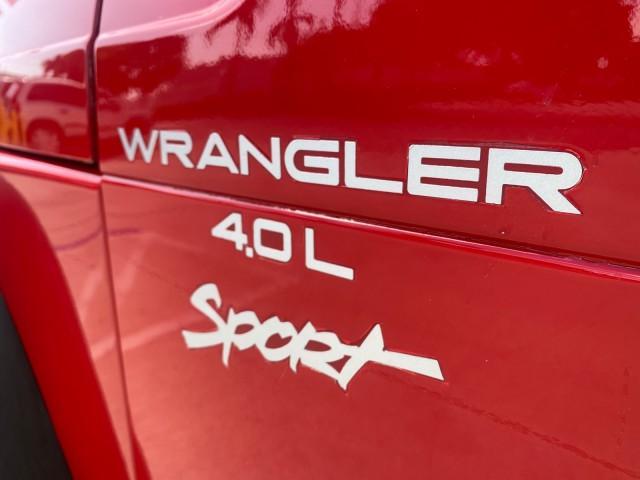 1999 Flame Red /Agate Jeep Wrangler Sport AUTO AC 4.0 6 CYL LOW MILES 92,727 (1J4FY19S2XP) with an 4.0L SMPI I6 Power Tech Engine engine, Automatic transmission, located at 4701 North Dixie Hwy, Pompano Beach, FL, 33064, (954) 422-2889, 26.240938, -80.123474 - OUR WEBPAGE FLORIDACARS1.COM HAS OVER 100 PHOTOS AND FREE CARFAX LINK 1999 Jeep Wrangler Sport 4WD Utility 4.0L I6 F Gasoline 20 MPG Rear Wheel Drive w/ 4X4 Features 4WD/AWD Air Conditioning Alloy Wheels AM/FM Stereo Automatic Transmission CD Audio Cloth Seats Cruise Control Running Boards Soft Top- Photo#40