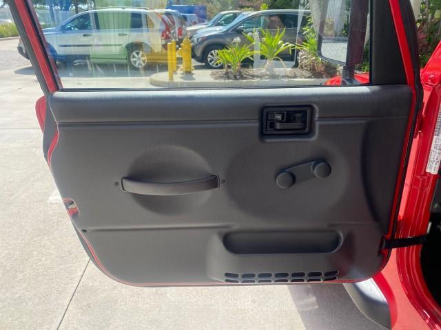 1999 Flame Red /Agate Jeep Wrangler Sport AUTO AC 4.0 6 CYL LOW MILES 92,727 (1J4FY19S2XP) with an 4.0L SMPI I6 Power Tech Engine engine, Automatic transmission, located at 4701 North Dixie Hwy, Pompano Beach, FL, 33064, (954) 422-2889, 26.240938, -80.123474 - OUR WEBPAGE FLORIDACARS1.COM HAS OVER 100 PHOTOS AND FREE CARFAX LINK 1999 Jeep Wrangler Sport 4WD Utility 4.0L I6 F Gasoline 20 MPG Rear Wheel Drive w/ 4X4 Features 4WD/AWD Air Conditioning Alloy Wheels AM/FM Stereo Automatic Transmission CD Audio Cloth Seats Cruise Control Running Boards Soft Top- Photo#43