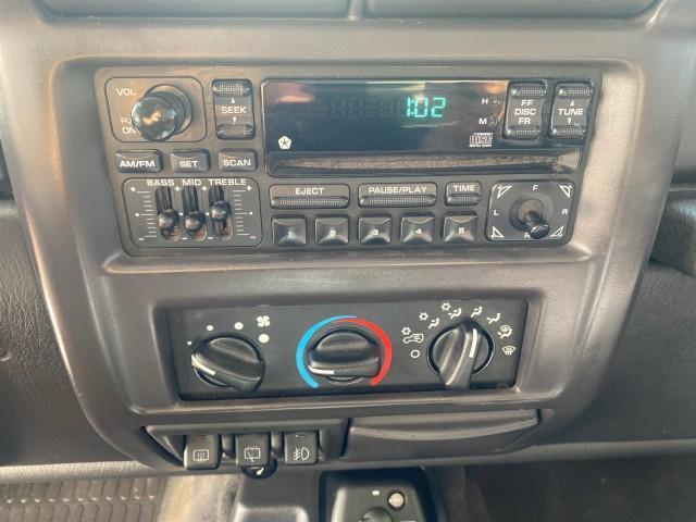 1999 Flame Red /Agate Jeep Wrangler Sport AUTO AC 4.0 6 CYL LOW MILES 92,727 (1J4FY19S2XP) with an 4.0L SMPI I6 Power Tech Engine engine, Automatic transmission, located at 4701 North Dixie Hwy, Pompano Beach, FL, 33064, (954) 422-2889, 26.240938, -80.123474 - OUR WEBPAGE FLORIDACARS1.COM HAS OVER 100 PHOTOS AND FREE CARFAX LINK 1999 Jeep Wrangler Sport 4WD Utility 4.0L I6 F Gasoline 20 MPG Rear Wheel Drive w/ 4X4 Features 4WD/AWD Air Conditioning Alloy Wheels AM/FM Stereo Automatic Transmission CD Audio Cloth Seats Cruise Control Running Boards Soft Top- Photo#60