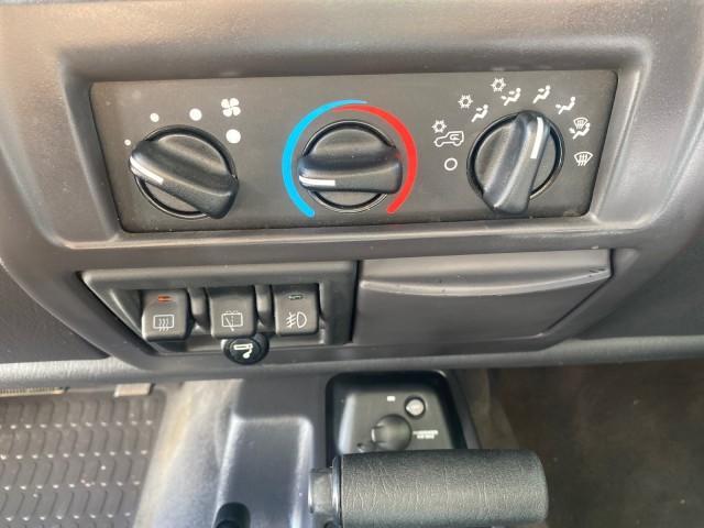 1999 Flame Red /Agate Jeep Wrangler Sport AUTO AC 4.0 6 CYL LOW MILES 92,727 (1J4FY19S2XP) with an 4.0L SMPI I6 Power Tech Engine engine, Automatic transmission, located at 4701 North Dixie Hwy, Pompano Beach, FL, 33064, (954) 422-2889, 26.240938, -80.123474 - OUR WEBPAGE FLORIDACARS1.COM HAS OVER 100 PHOTOS AND FREE CARFAX LINK 1999 Jeep Wrangler Sport 4WD Utility 4.0L I6 F Gasoline 20 MPG Rear Wheel Drive w/ 4X4 Features 4WD/AWD Air Conditioning Alloy Wheels AM/FM Stereo Automatic Transmission CD Audio Cloth Seats Cruise Control Running Boards Soft Top- Photo#61