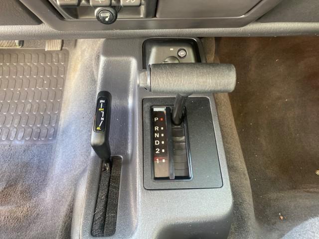 1999 Flame Red /Agate Jeep Wrangler Sport AUTO AC 4.0 6 CYL LOW MILES 92,727 (1J4FY19S2XP) with an 4.0L SMPI I6 Power Tech Engine engine, Automatic transmission, located at 4701 North Dixie Hwy, Pompano Beach, FL, 33064, (954) 422-2889, 26.240938, -80.123474 - OUR WEBPAGE FLORIDACARS1.COM HAS OVER 100 PHOTOS AND FREE CARFAX LINK 1999 Jeep Wrangler Sport 4WD Utility 4.0L I6 F Gasoline 20 MPG Rear Wheel Drive w/ 4X4 Features 4WD/AWD Air Conditioning Alloy Wheels AM/FM Stereo Automatic Transmission CD Audio Cloth Seats Cruise Control Running Boards Soft Top- Photo#62