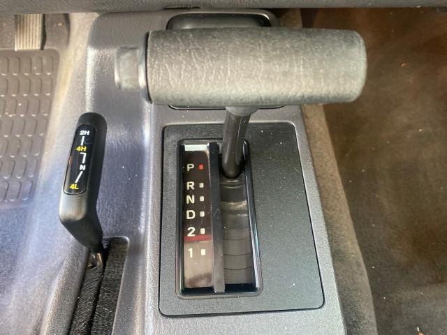 1999 Flame Red /Agate Jeep Wrangler Sport AUTO AC 4.0 6 CYL LOW MILES 92,727 (1J4FY19S2XP) with an 4.0L SMPI I6 Power Tech Engine engine, Automatic transmission, located at 4701 North Dixie Hwy, Pompano Beach, FL, 33064, (954) 422-2889, 26.240938, -80.123474 - OUR WEBPAGE FLORIDACARS1.COM HAS OVER 100 PHOTOS AND FREE CARFAX LINK 1999 Jeep Wrangler Sport 4WD Utility 4.0L I6 F Gasoline 20 MPG Rear Wheel Drive w/ 4X4 Features 4WD/AWD Air Conditioning Alloy Wheels AM/FM Stereo Automatic Transmission CD Audio Cloth Seats Cruise Control Running Boards Soft Top- Photo#65