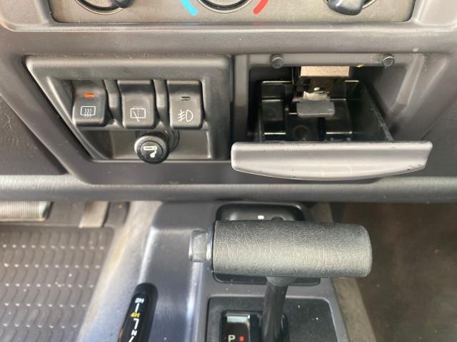 1999 Flame Red /Agate Jeep Wrangler Sport AUTO AC 4.0 6 CYL LOW MILES 92,727 (1J4FY19S2XP) with an 4.0L SMPI I6 Power Tech Engine engine, Automatic transmission, located at 4701 North Dixie Hwy, Pompano Beach, FL, 33064, (954) 422-2889, 26.240938, -80.123474 - OUR WEBPAGE FLORIDACARS1.COM HAS OVER 100 PHOTOS AND FREE CARFAX LINK 1999 Jeep Wrangler Sport 4WD Utility 4.0L I6 F Gasoline 20 MPG Rear Wheel Drive w/ 4X4 Features 4WD/AWD Air Conditioning Alloy Wheels AM/FM Stereo Automatic Transmission CD Audio Cloth Seats Cruise Control Running Boards Soft Top- Photo#66