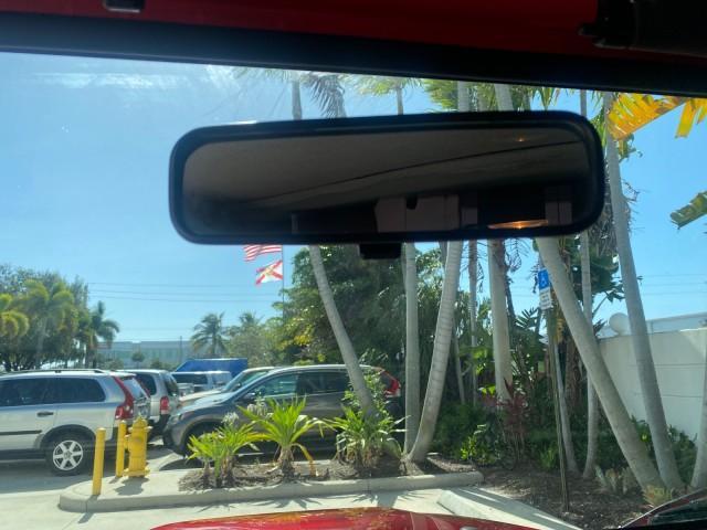 1999 Flame Red /Agate Jeep Wrangler Sport AUTO AC 4.0 6 CYL LOW MILES 92,727 (1J4FY19S2XP) with an 4.0L SMPI I6 Power Tech Engine engine, Automatic transmission, located at 4701 North Dixie Hwy, Pompano Beach, FL, 33064, (954) 422-2889, 26.240938, -80.123474 - OUR WEBPAGE FLORIDACARS1.COM HAS OVER 100 PHOTOS AND FREE CARFAX LINK 1999 Jeep Wrangler Sport 4WD Utility 4.0L I6 F Gasoline 20 MPG Rear Wheel Drive w/ 4X4 Features 4WD/AWD Air Conditioning Alloy Wheels AM/FM Stereo Automatic Transmission CD Audio Cloth Seats Cruise Control Running Boards Soft Top- Photo#67
