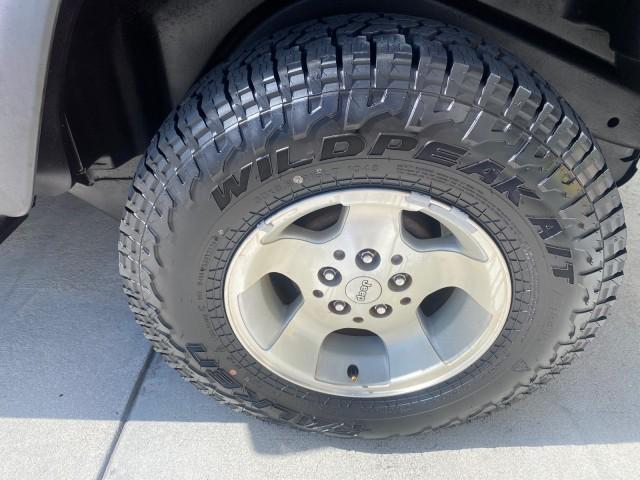 1999 Flame Red /Agate Jeep Wrangler Sport AUTO AC 4.0 6 CYL LOW MILES 92,727 (1J4FY19S2XP) with an 4.0L SMPI I6 Power Tech Engine engine, Automatic transmission, located at 4701 North Dixie Hwy, Pompano Beach, FL, 33064, (954) 422-2889, 26.240938, -80.123474 - OUR WEBPAGE FLORIDACARS1.COM HAS OVER 100 PHOTOS AND FREE CARFAX LINK 1999 Jeep Wrangler Sport 4WD Utility 4.0L I6 F Gasoline 20 MPG Rear Wheel Drive w/ 4X4 Features 4WD/AWD Air Conditioning Alloy Wheels AM/FM Stereo Automatic Transmission CD Audio Cloth Seats Cruise Control Running Boards Soft Top- Photo#76