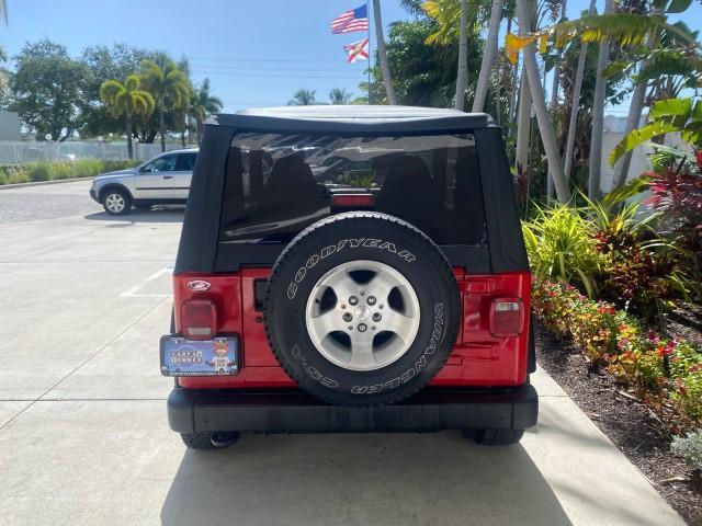 1999 Flame Red /Agate Jeep Wrangler Sport AUTO AC 4.0 6 CYL LOW MILES 92,727 (1J4FY19S2XP) with an 4.0L SMPI I6 Power Tech Engine engine, Automatic transmission, located at 4701 North Dixie Hwy, Pompano Beach, FL, 33064, (954) 422-2889, 26.240938, -80.123474 - OUR WEBPAGE FLORIDACARS1.COM HAS OVER 100 PHOTOS AND FREE CARFAX LINK 1999 Jeep Wrangler Sport 4WD Utility 4.0L I6 F Gasoline 20 MPG Rear Wheel Drive w/ 4X4 Features 4WD/AWD Air Conditioning Alloy Wheels AM/FM Stereo Automatic Transmission CD Audio Cloth Seats Cruise Control Running Boards Soft Top- Photo#79