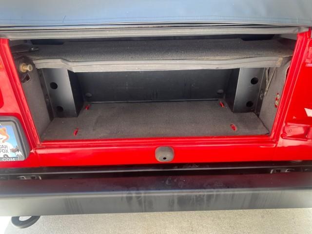 1999 Flame Red /Agate Jeep Wrangler Sport AUTO AC 4.0 6 CYL LOW MILES 92,727 (1J4FY19S2XP) with an 4.0L SMPI I6 Power Tech Engine engine, Automatic transmission, located at 4701 North Dixie Hwy, Pompano Beach, FL, 33064, (954) 422-2889, 26.240938, -80.123474 - OUR WEBPAGE FLORIDACARS1.COM HAS OVER 100 PHOTOS AND FREE CARFAX LINK 1999 Jeep Wrangler Sport 4WD Utility 4.0L I6 F Gasoline 20 MPG Rear Wheel Drive w/ 4X4 Features 4WD/AWD Air Conditioning Alloy Wheels AM/FM Stereo Automatic Transmission CD Audio Cloth Seats Cruise Control Running Boards Soft Top- Photo#86