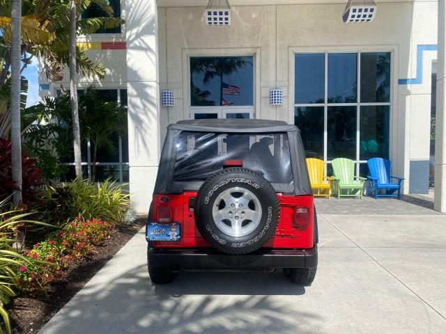 1999 Flame Red /Agate Jeep Wrangler Sport AUTO AC 4.0 6 CYL LOW MILES 92,727 (1J4FY19S2XP) with an 4.0L SMPI I6 Power Tech Engine engine, Automatic transmission, located at 4701 North Dixie Hwy, Pompano Beach, FL, 33064, (954) 422-2889, 26.240938, -80.123474 - OUR WEBPAGE FLORIDACARS1.COM HAS OVER 100 PHOTOS AND FREE CARFAX LINK 1999 Jeep Wrangler Sport 4WD Utility 4.0L I6 F Gasoline 20 MPG Rear Wheel Drive w/ 4X4 Features 4WD/AWD Air Conditioning Alloy Wheels AM/FM Stereo Automatic Transmission CD Audio Cloth Seats Cruise Control Running Boards Soft Top- Photo#87