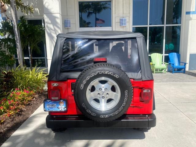 1999 Flame Red /Agate Jeep Wrangler Sport AUTO AC 4.0 6 CYL LOW MILES 92,727 (1J4FY19S2XP) with an 4.0L SMPI I6 Power Tech Engine engine, Automatic transmission, located at 4701 North Dixie Hwy, Pompano Beach, FL, 33064, (954) 422-2889, 26.240938, -80.123474 - OUR WEBPAGE FLORIDACARS1.COM HAS OVER 100 PHOTOS AND FREE CARFAX LINK 1999 Jeep Wrangler Sport 4WD Utility 4.0L I6 F Gasoline 20 MPG Rear Wheel Drive w/ 4X4 Features 4WD/AWD Air Conditioning Alloy Wheels AM/FM Stereo Automatic Transmission CD Audio Cloth Seats Cruise Control Running Boards Soft Top- Photo#88