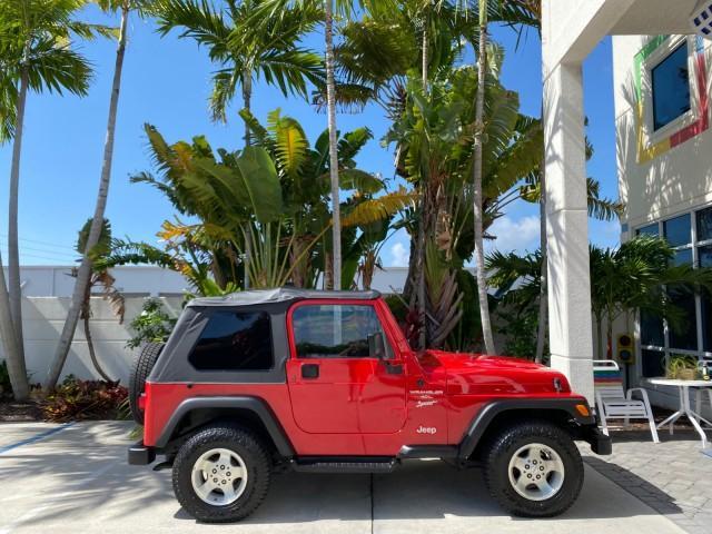 1999 Flame Red /Agate Jeep Wrangler Sport AUTO AC 4.0 6 CYL LOW MILES 92,727 (1J4FY19S2XP) with an 4.0L SMPI I6 Power Tech Engine engine, Automatic transmission, located at 4701 North Dixie Hwy, Pompano Beach, FL, 33064, (954) 422-2889, 26.240938, -80.123474 - OUR WEBPAGE FLORIDACARS1.COM HAS OVER 100 PHOTOS AND FREE CARFAX LINK 1999 Jeep Wrangler Sport 4WD Utility 4.0L I6 F Gasoline 20 MPG Rear Wheel Drive w/ 4X4 Features 4WD/AWD Air Conditioning Alloy Wheels AM/FM Stereo Automatic Transmission CD Audio Cloth Seats Cruise Control Running Boards Soft Top- Photo#91