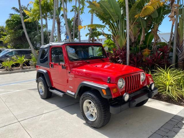 1999 Flame Red /Agate Jeep Wrangler Sport AUTO AC 4.0 6 CYL LOW MILES 92,727 (1J4FY19S2XP) with an 4.0L SMPI I6 Power Tech Engine engine, Automatic transmission, located at 4701 North Dixie Hwy, Pompano Beach, FL, 33064, (954) 422-2889, 26.240938, -80.123474 - OUR WEBPAGE FLORIDACARS1.COM HAS OVER 100 PHOTOS AND FREE CARFAX LINK 1999 Jeep Wrangler Sport 4WD Utility 4.0L I6 F Gasoline 20 MPG Rear Wheel Drive w/ 4X4 Features 4WD/AWD Air Conditioning Alloy Wheels AM/FM Stereo Automatic Transmission CD Audio Cloth Seats Cruise Control Running Boards Soft Top- Photo#93