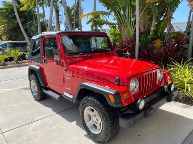 1999 Flame Red /Agate Jeep Wrangler Sport AUTO AC 4.0 6 CYL LOW MILES 92,727 (1J4FY19S2XP) with an 4.0L SMPI I6 Power Tech Engine engine, Automatic transmission, located at 4701 North Dixie Hwy, Pompano Beach, FL, 33064, (954) 422-2889, 26.240938, -80.123474 - OUR WEBPAGE FLORIDACARS1.COM HAS OVER 100 PHOTOS AND FREE CARFAX LINK 1999 Jeep Wrangler Sport 4WD Utility 4.0L I6 F Gasoline 20 MPG Rear Wheel Drive w/ 4X4 Features 4WD/AWD Air Conditioning Alloy Wheels AM/FM Stereo Automatic Transmission CD Audio Cloth Seats Cruise Control Running Boards Soft Top- Photo#94