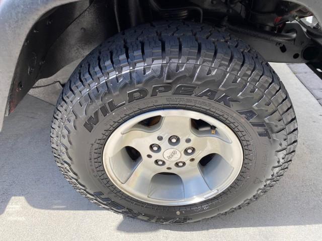 1999 Flame Red /Agate Jeep Wrangler Sport AUTO AC 4.0 6 CYL LOW MILES 92,727 (1J4FY19S2XP) with an 4.0L SMPI I6 Power Tech Engine engine, Automatic transmission, located at 4701 North Dixie Hwy, Pompano Beach, FL, 33064, (954) 422-2889, 26.240938, -80.123474 - OUR WEBPAGE FLORIDACARS1.COM HAS OVER 100 PHOTOS AND FREE CARFAX LINK 1999 Jeep Wrangler Sport 4WD Utility 4.0L I6 F Gasoline 20 MPG Rear Wheel Drive w/ 4X4 Features 4WD/AWD Air Conditioning Alloy Wheels AM/FM Stereo Automatic Transmission CD Audio Cloth Seats Cruise Control Running Boards Soft Top- Photo#97