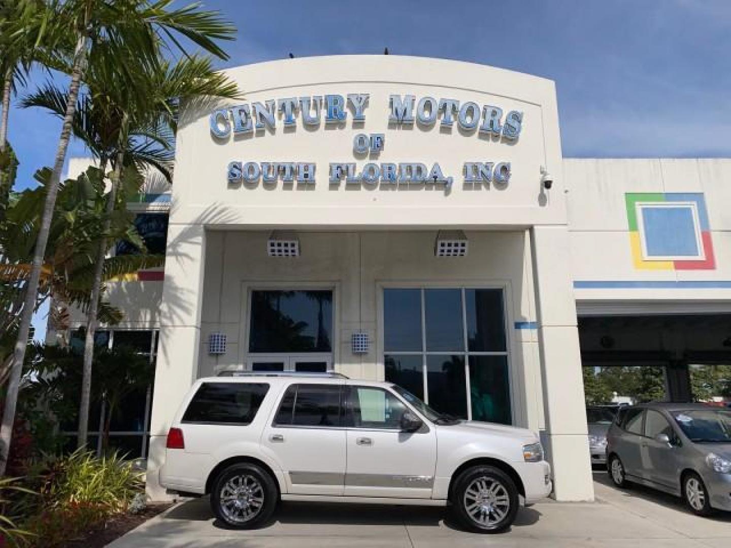2010 White Platinum Tri-Coat Metallic /Camel Lincoln Navigator 4WD SUNROOF LOW MILES 31,209 (5LMJJ2J50AE) with an 5.4L SOHC 24-Valve V8 FFV Engine engine, Automatic transmission, located at 4701 North Dixie Hwy, Pompano Beach, FL, 33064, (954) 422-2889, 26.240938, -80.123474 - OUR WEBPAGE FLORIDACARS1.COM HAS OVER 100 PHOTOS AND FREE CARFAX LINK 2010 Lincoln Navigator 4 Door Wagon/Sport Utility 5.4L V8 F SOHC 24V Flex Fuel 18 MPG Rear Wheel Drive w/ 4X4 Features 20 Inch Plus Wheels 4WD/AWD A/C Seat(s) ABS Brakes Air Conditioning Alloy Wheels AM/FM Stereo Automatic Transmi- Photo#0