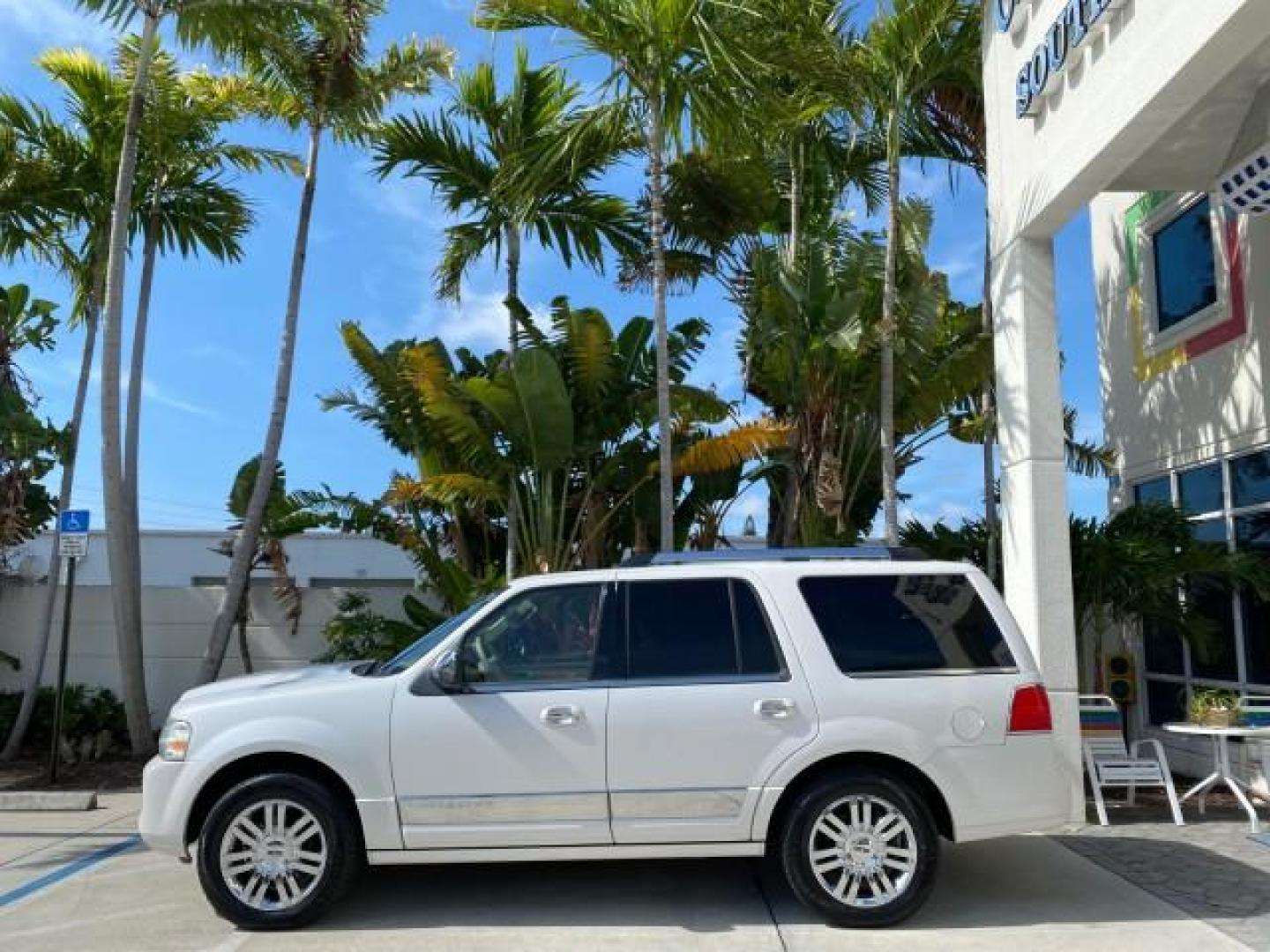 2010 White Platinum Tri-Coat Metallic /Camel Lincoln Navigator 4WD SUNROOF LOW MILES 31,209 (5LMJJ2J50AE) with an 5.4L SOHC 24-Valve V8 FFV Engine engine, Automatic transmission, located at 4701 North Dixie Hwy, Pompano Beach, FL, 33064, (954) 422-2889, 26.240938, -80.123474 - OUR WEBPAGE FLORIDACARS1.COM HAS OVER 100 PHOTOS AND FREE CARFAX LINK 2010 Lincoln Navigator 4 Door Wagon/Sport Utility 5.4L V8 F SOHC 24V Flex Fuel 18 MPG Rear Wheel Drive w/ 4X4 Features 20 Inch Plus Wheels 4WD/AWD A/C Seat(s) ABS Brakes Air Conditioning Alloy Wheels AM/FM Stereo Automatic Transmi- Photo#4