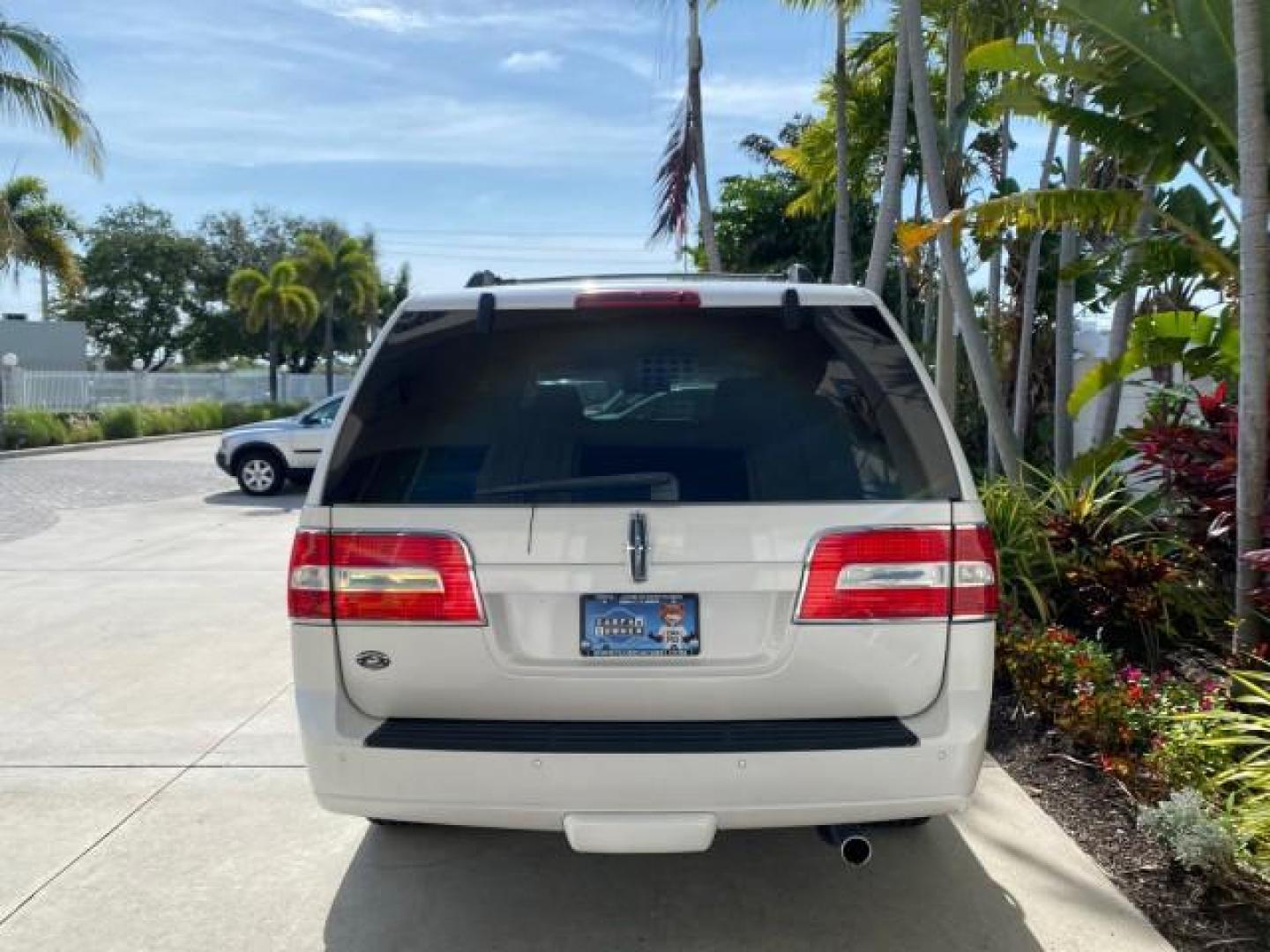 2010 White Platinum Tri-Coat Metallic /Camel Lincoln Navigator 4WD SUNROOF LOW MILES 31,209 (5LMJJ2J50AE) with an 5.4L SOHC 24-Valve V8 FFV Engine engine, Automatic transmission, located at 4701 North Dixie Hwy, Pompano Beach, FL, 33064, (954) 422-2889, 26.240938, -80.123474 - OUR WEBPAGE FLORIDACARS1.COM HAS OVER 100 PHOTOS AND FREE CARFAX LINK 2010 Lincoln Navigator 4 Door Wagon/Sport Utility 5.4L V8 F SOHC 24V Flex Fuel 18 MPG Rear Wheel Drive w/ 4X4 Features 20 Inch Plus Wheels 4WD/AWD A/C Seat(s) ABS Brakes Air Conditioning Alloy Wheels AM/FM Stereo Automatic Transmi- Photo#6