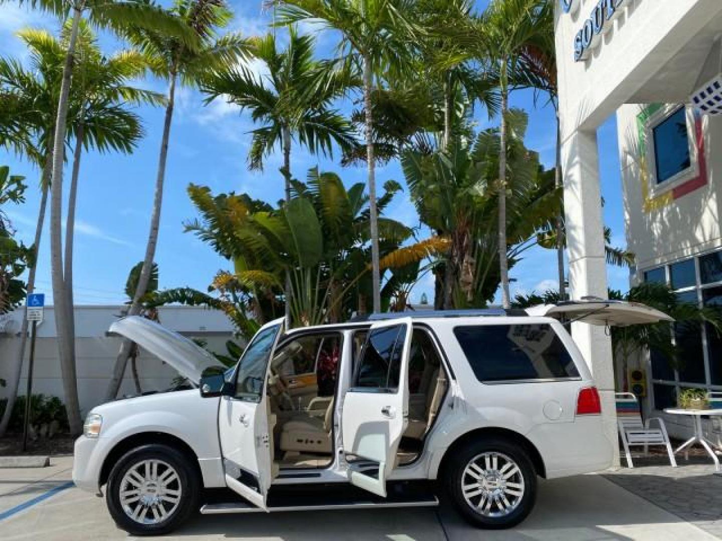 2010 White Platinum Tri-Coat Metallic /Camel Lincoln Navigator 4WD SUNROOF LOW MILES 31,209 (5LMJJ2J50AE) with an 5.4L SOHC 24-Valve V8 FFV Engine engine, Automatic transmission, located at 4701 North Dixie Hwy, Pompano Beach, FL, 33064, (954) 422-2889, 26.240938, -80.123474 - OUR WEBPAGE FLORIDACARS1.COM HAS OVER 100 PHOTOS AND FREE CARFAX LINK 2010 Lincoln Navigator 4 Door Wagon/Sport Utility 5.4L V8 F SOHC 24V Flex Fuel 18 MPG Rear Wheel Drive w/ 4X4 Features 20 Inch Plus Wheels 4WD/AWD A/C Seat(s) ABS Brakes Air Conditioning Alloy Wheels AM/FM Stereo Automatic Transmi- Photo#8