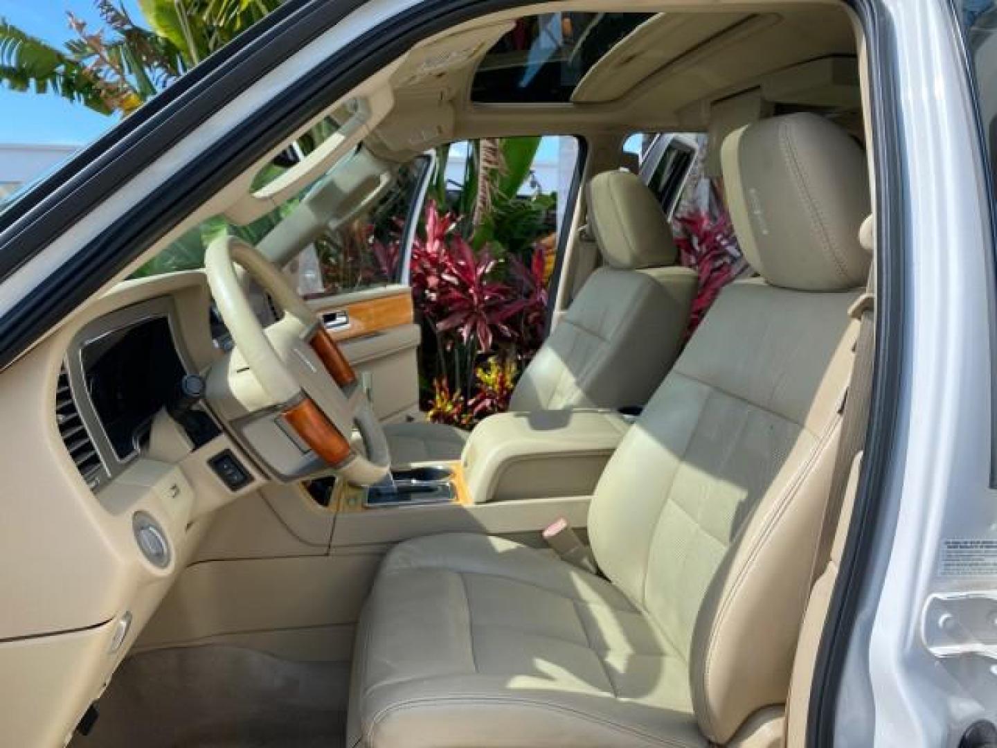 2010 White Platinum Tri-Coat Metallic /Camel Lincoln Navigator 4WD SUNROOF LOW MILES 31,209 (5LMJJ2J50AE) with an 5.4L SOHC 24-Valve V8 FFV Engine engine, Automatic transmission, located at 4701 North Dixie Hwy, Pompano Beach, FL, 33064, (954) 422-2889, 26.240938, -80.123474 - OUR WEBPAGE FLORIDACARS1.COM HAS OVER 100 PHOTOS AND FREE CARFAX LINK 2010 Lincoln Navigator 4 Door Wagon/Sport Utility 5.4L V8 F SOHC 24V Flex Fuel 18 MPG Rear Wheel Drive w/ 4X4 Features 20 Inch Plus Wheels 4WD/AWD A/C Seat(s) ABS Brakes Air Conditioning Alloy Wheels AM/FM Stereo Automatic Transmi- Photo#10
