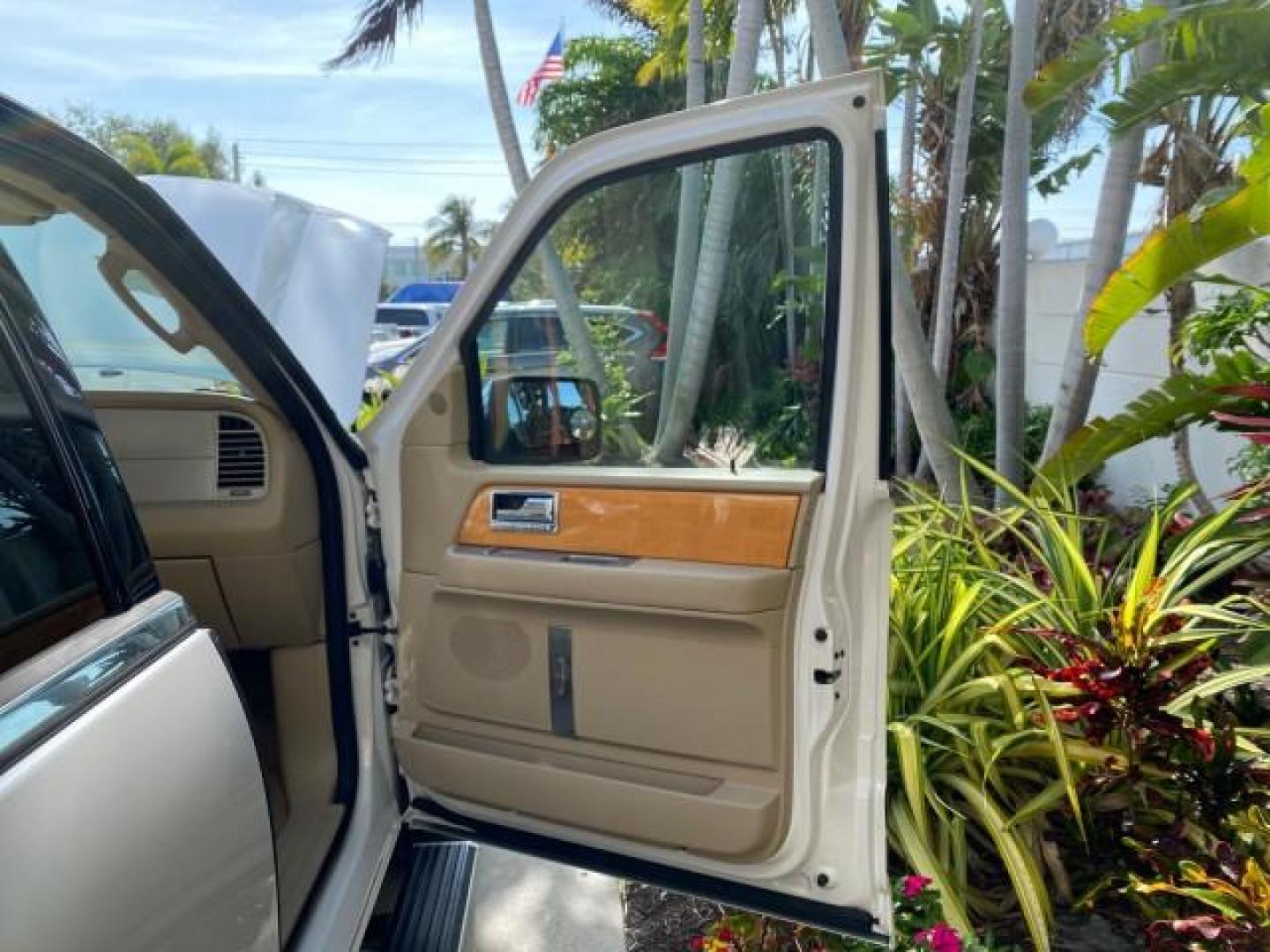 2010 White Platinum Tri-Coat Metallic /Camel Lincoln Navigator 4WD SUNROOF LOW MILES 31,209 (5LMJJ2J50AE) with an 5.4L SOHC 24-Valve V8 FFV Engine engine, Automatic transmission, located at 4701 North Dixie Hwy, Pompano Beach, FL, 33064, (954) 422-2889, 26.240938, -80.123474 - OUR WEBPAGE FLORIDACARS1.COM HAS OVER 100 PHOTOS AND FREE CARFAX LINK 2010 Lincoln Navigator 4 Door Wagon/Sport Utility 5.4L V8 F SOHC 24V Flex Fuel 18 MPG Rear Wheel Drive w/ 4X4 Features 20 Inch Plus Wheels 4WD/AWD A/C Seat(s) ABS Brakes Air Conditioning Alloy Wheels AM/FM Stereo Automatic Transmi- Photo#11