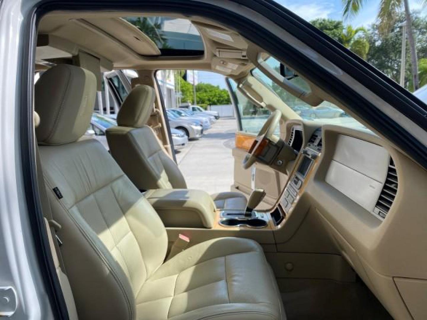2010 White Platinum Tri-Coat Metallic /Camel Lincoln Navigator 4WD SUNROOF LOW MILES 31,209 (5LMJJ2J50AE) with an 5.4L SOHC 24-Valve V8 FFV Engine engine, Automatic transmission, located at 4701 North Dixie Hwy, Pompano Beach, FL, 33064, (954) 422-2889, 26.240938, -80.123474 - OUR WEBPAGE FLORIDACARS1.COM HAS OVER 100 PHOTOS AND FREE CARFAX LINK 2010 Lincoln Navigator 4 Door Wagon/Sport Utility 5.4L V8 F SOHC 24V Flex Fuel 18 MPG Rear Wheel Drive w/ 4X4 Features 20 Inch Plus Wheels 4WD/AWD A/C Seat(s) ABS Brakes Air Conditioning Alloy Wheels AM/FM Stereo Automatic Transmi- Photo#12