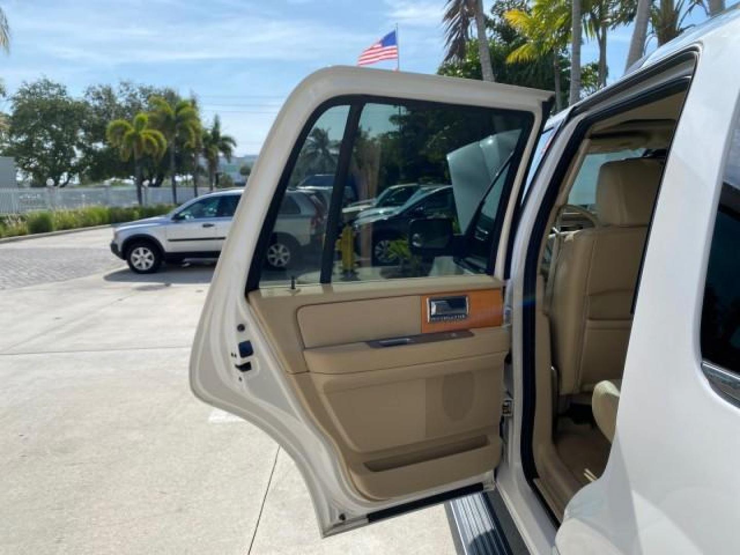 2010 White Platinum Tri-Coat Metallic /Camel Lincoln Navigator 4WD SUNROOF LOW MILES 31,209 (5LMJJ2J50AE) with an 5.4L SOHC 24-Valve V8 FFV Engine engine, Automatic transmission, located at 4701 North Dixie Hwy, Pompano Beach, FL, 33064, (954) 422-2889, 26.240938, -80.123474 - OUR WEBPAGE FLORIDACARS1.COM HAS OVER 100 PHOTOS AND FREE CARFAX LINK 2010 Lincoln Navigator 4 Door Wagon/Sport Utility 5.4L V8 F SOHC 24V Flex Fuel 18 MPG Rear Wheel Drive w/ 4X4 Features 20 Inch Plus Wheels 4WD/AWD A/C Seat(s) ABS Brakes Air Conditioning Alloy Wheels AM/FM Stereo Automatic Transmi- Photo#13