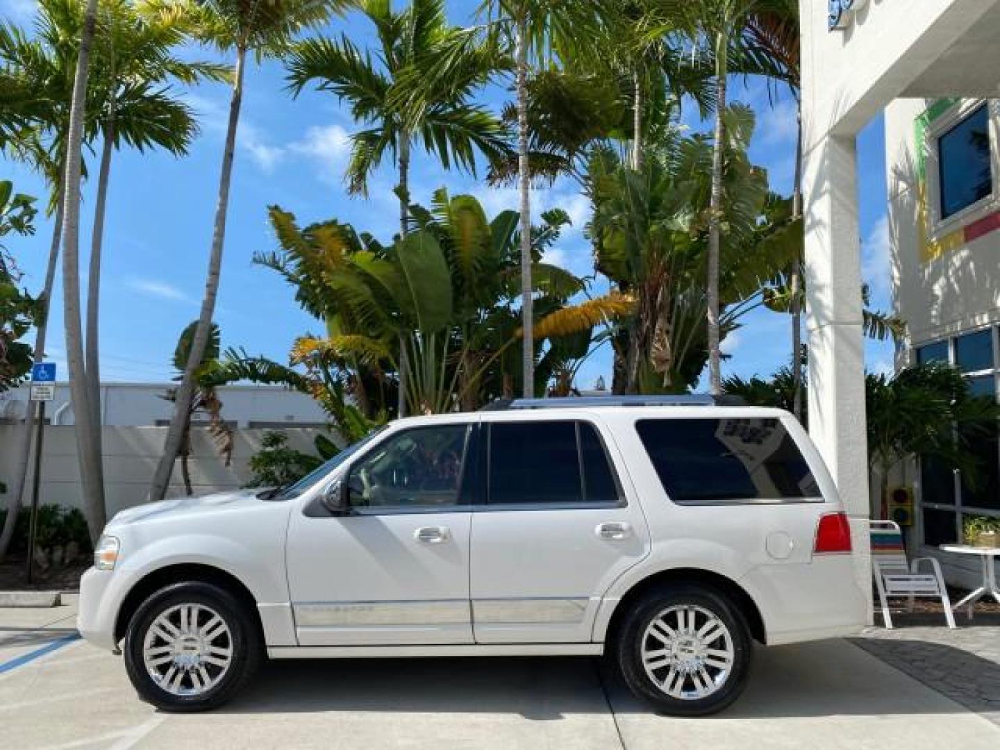 2010 White Platinum Tri-Coat Metallic /Camel Lincoln Navigator 4WD SUNROOF LOW MILES 31,209 (5LMJJ2J50AE) with an 5.4L SOHC 24-Valve V8 FFV Engine engine, Automatic transmission, located at 4701 North Dixie Hwy, Pompano Beach, FL, 33064, (954) 422-2889, 26.240938, -80.123474 - OUR WEBPAGE FLORIDACARS1.COM HAS OVER 100 PHOTOS AND FREE CARFAX LINK 2010 Lincoln Navigator 4 Door Wagon/Sport Utility 5.4L V8 F SOHC 24V Flex Fuel 18 MPG Rear Wheel Drive w/ 4X4 Features 20 Inch Plus Wheels 4WD/AWD A/C Seat(s) ABS Brakes Air Conditioning Alloy Wheels AM/FM Stereo Automatic Transmi- Photo#30