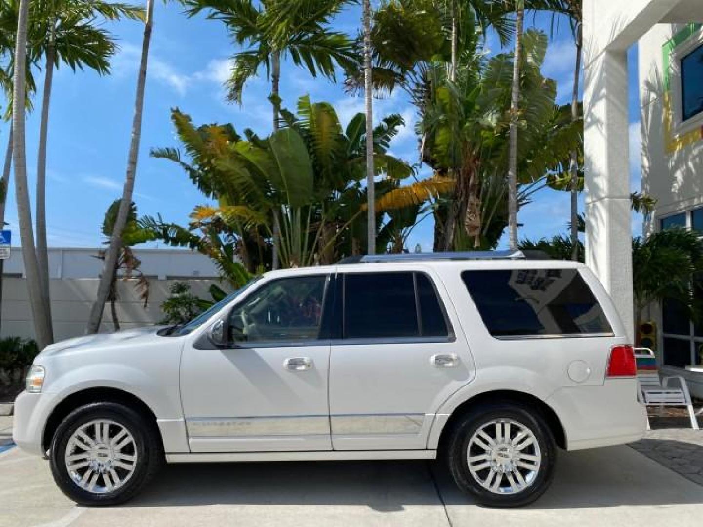 2010 White Platinum Tri-Coat Metallic /Camel Lincoln Navigator 4WD SUNROOF LOW MILES 31,209 (5LMJJ2J50AE) with an 5.4L SOHC 24-Valve V8 FFV Engine engine, Automatic transmission, located at 4701 North Dixie Hwy, Pompano Beach, FL, 33064, (954) 422-2889, 26.240938, -80.123474 - OUR WEBPAGE FLORIDACARS1.COM HAS OVER 100 PHOTOS AND FREE CARFAX LINK 2010 Lincoln Navigator 4 Door Wagon/Sport Utility 5.4L V8 F SOHC 24V Flex Fuel 18 MPG Rear Wheel Drive w/ 4X4 Features 20 Inch Plus Wheels 4WD/AWD A/C Seat(s) ABS Brakes Air Conditioning Alloy Wheels AM/FM Stereo Automatic Transmi- Photo#31