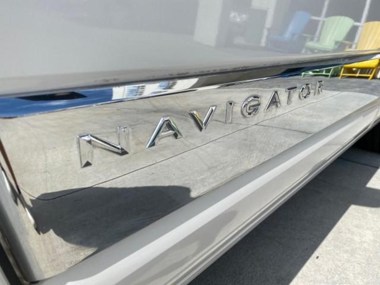 2010 White Platinum Tri-Coat Metallic /Camel Lincoln Navigator 4WD SUNROOF LOW MILES 31,209 (5LMJJ2J50AE) with an 5.4L SOHC 24-Valve V8 FFV Engine engine, Automatic transmission, located at 4701 North Dixie Hwy, Pompano Beach, FL, 33064, (954) 422-2889, 26.240938, -80.123474 - OUR WEBPAGE FLORIDACARS1.COM HAS OVER 100 PHOTOS AND FREE CARFAX LINK 2010 Lincoln Navigator 4 Door Wagon/Sport Utility 5.4L V8 F SOHC 24V Flex Fuel 18 MPG Rear Wheel Drive w/ 4X4 Features 20 Inch Plus Wheels 4WD/AWD A/C Seat(s) ABS Brakes Air Conditioning Alloy Wheels AM/FM Stereo Automatic Transmi- Photo#41