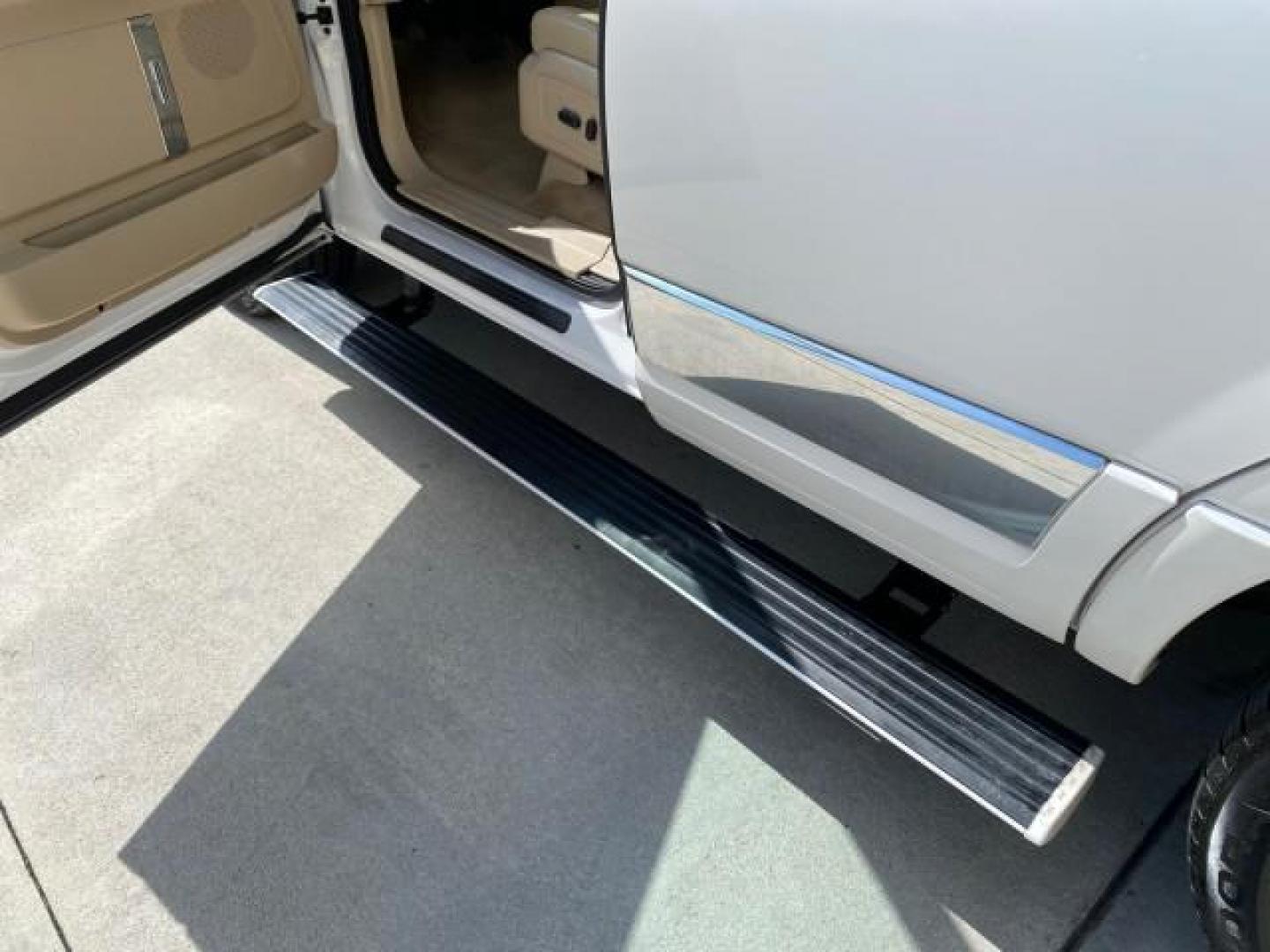 2010 White Platinum Tri-Coat Metallic /Camel Lincoln Navigator 4WD SUNROOF LOW MILES 31,209 (5LMJJ2J50AE) with an 5.4L SOHC 24-Valve V8 FFV Engine engine, Automatic transmission, located at 4701 North Dixie Hwy, Pompano Beach, FL, 33064, (954) 422-2889, 26.240938, -80.123474 - OUR WEBPAGE FLORIDACARS1.COM HAS OVER 100 PHOTOS AND FREE CARFAX LINK 2010 Lincoln Navigator 4 Door Wagon/Sport Utility 5.4L V8 F SOHC 24V Flex Fuel 18 MPG Rear Wheel Drive w/ 4X4 Features 20 Inch Plus Wheels 4WD/AWD A/C Seat(s) ABS Brakes Air Conditioning Alloy Wheels AM/FM Stereo Automatic Transmi- Photo#42