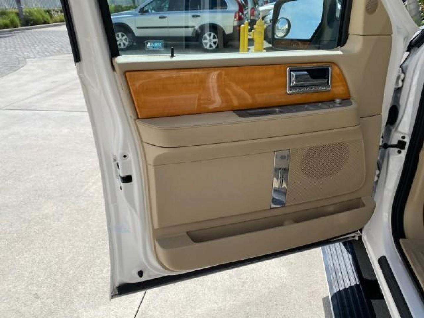 2010 White Platinum Tri-Coat Metallic /Camel Lincoln Navigator 4WD SUNROOF LOW MILES 31,209 (5LMJJ2J50AE) with an 5.4L SOHC 24-Valve V8 FFV Engine engine, Automatic transmission, located at 4701 North Dixie Hwy, Pompano Beach, FL, 33064, (954) 422-2889, 26.240938, -80.123474 - OUR WEBPAGE FLORIDACARS1.COM HAS OVER 100 PHOTOS AND FREE CARFAX LINK 2010 Lincoln Navigator 4 Door Wagon/Sport Utility 5.4L V8 F SOHC 24V Flex Fuel 18 MPG Rear Wheel Drive w/ 4X4 Features 20 Inch Plus Wheels 4WD/AWD A/C Seat(s) ABS Brakes Air Conditioning Alloy Wheels AM/FM Stereo Automatic Transmi- Photo#43