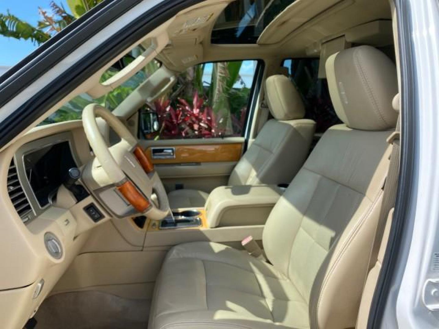 2010 White Platinum Tri-Coat Metallic /Camel Lincoln Navigator 4WD SUNROOF LOW MILES 31,209 (5LMJJ2J50AE) with an 5.4L SOHC 24-Valve V8 FFV Engine engine, Automatic transmission, located at 4701 North Dixie Hwy, Pompano Beach, FL, 33064, (954) 422-2889, 26.240938, -80.123474 - OUR WEBPAGE FLORIDACARS1.COM HAS OVER 100 PHOTOS AND FREE CARFAX LINK 2010 Lincoln Navigator 4 Door Wagon/Sport Utility 5.4L V8 F SOHC 24V Flex Fuel 18 MPG Rear Wheel Drive w/ 4X4 Features 20 Inch Plus Wheels 4WD/AWD A/C Seat(s) ABS Brakes Air Conditioning Alloy Wheels AM/FM Stereo Automatic Transmi- Photo#45