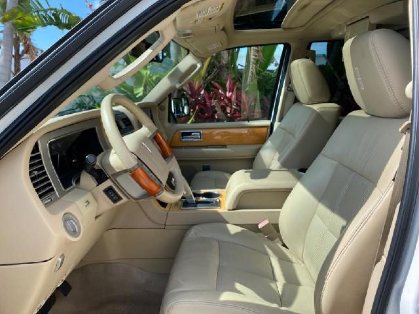 2010 White Platinum Tri-Coat Metallic /Camel Lincoln Navigator 4WD SUNROOF LOW MILES 31,209 (5LMJJ2J50AE) with an 5.4L SOHC 24-Valve V8 FFV Engine engine, Automatic transmission, located at 4701 North Dixie Hwy, Pompano Beach, FL, 33064, (954) 422-2889, 26.240938, -80.123474 - OUR WEBPAGE FLORIDACARS1.COM HAS OVER 100 PHOTOS AND FREE CARFAX LINK 2010 Lincoln Navigator 4 Door Wagon/Sport Utility 5.4L V8 F SOHC 24V Flex Fuel 18 MPG Rear Wheel Drive w/ 4X4 Features 20 Inch Plus Wheels 4WD/AWD A/C Seat(s) ABS Brakes Air Conditioning Alloy Wheels AM/FM Stereo Automatic Transmi- Photo#46