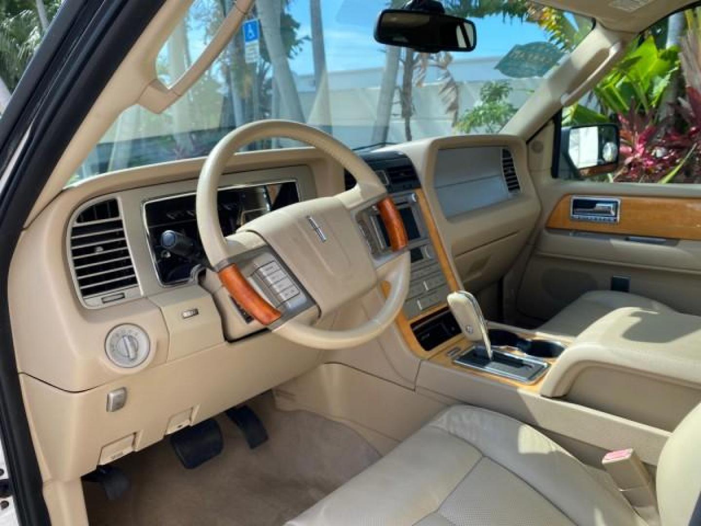 2010 White Platinum Tri-Coat Metallic /Camel Lincoln Navigator 4WD SUNROOF LOW MILES 31,209 (5LMJJ2J50AE) with an 5.4L SOHC 24-Valve V8 FFV Engine engine, Automatic transmission, located at 4701 North Dixie Hwy, Pompano Beach, FL, 33064, (954) 422-2889, 26.240938, -80.123474 - OUR WEBPAGE FLORIDACARS1.COM HAS OVER 100 PHOTOS AND FREE CARFAX LINK 2010 Lincoln Navigator 4 Door Wagon/Sport Utility 5.4L V8 F SOHC 24V Flex Fuel 18 MPG Rear Wheel Drive w/ 4X4 Features 20 Inch Plus Wheels 4WD/AWD A/C Seat(s) ABS Brakes Air Conditioning Alloy Wheels AM/FM Stereo Automatic Transmi- Photo#49