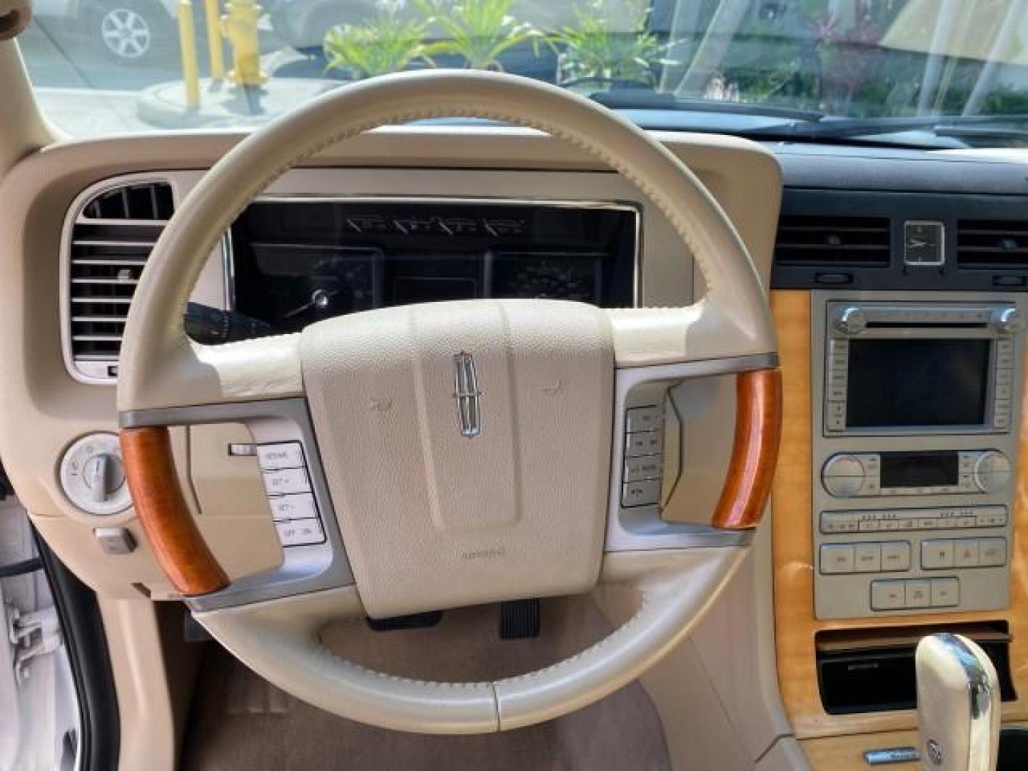 2010 White Platinum Tri-Coat Metallic /Camel Lincoln Navigator 4WD SUNROOF LOW MILES 31,209 (5LMJJ2J50AE) with an 5.4L SOHC 24-Valve V8 FFV Engine engine, Automatic transmission, located at 4701 North Dixie Hwy, Pompano Beach, FL, 33064, (954) 422-2889, 26.240938, -80.123474 - OUR WEBPAGE FLORIDACARS1.COM HAS OVER 100 PHOTOS AND FREE CARFAX LINK 2010 Lincoln Navigator 4 Door Wagon/Sport Utility 5.4L V8 F SOHC 24V Flex Fuel 18 MPG Rear Wheel Drive w/ 4X4 Features 20 Inch Plus Wheels 4WD/AWD A/C Seat(s) ABS Brakes Air Conditioning Alloy Wheels AM/FM Stereo Automatic Transmi- Photo#50