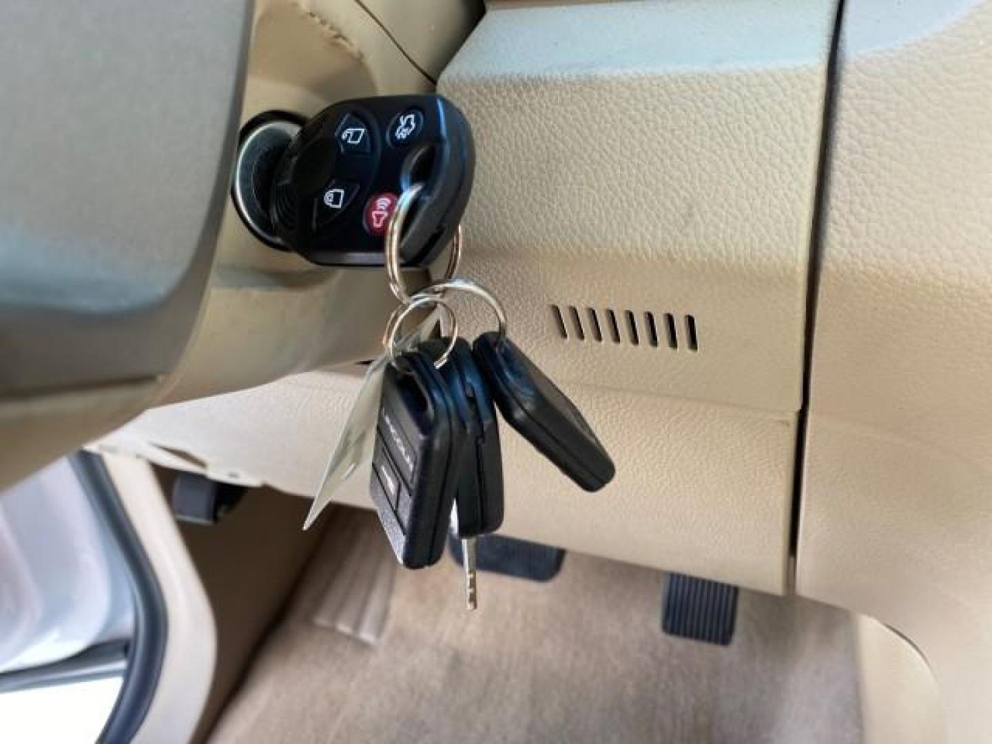 2010 White Platinum Tri-Coat Metallic /Camel Lincoln Navigator 4WD SUNROOF LOW MILES 31,209 (5LMJJ2J50AE) with an 5.4L SOHC 24-Valve V8 FFV Engine engine, Automatic transmission, located at 4701 North Dixie Hwy, Pompano Beach, FL, 33064, (954) 422-2889, 26.240938, -80.123474 - OUR WEBPAGE FLORIDACARS1.COM HAS OVER 100 PHOTOS AND FREE CARFAX LINK 2010 Lincoln Navigator 4 Door Wagon/Sport Utility 5.4L V8 F SOHC 24V Flex Fuel 18 MPG Rear Wheel Drive w/ 4X4 Features 20 Inch Plus Wheels 4WD/AWD A/C Seat(s) ABS Brakes Air Conditioning Alloy Wheels AM/FM Stereo Automatic Transmi- Photo#56
