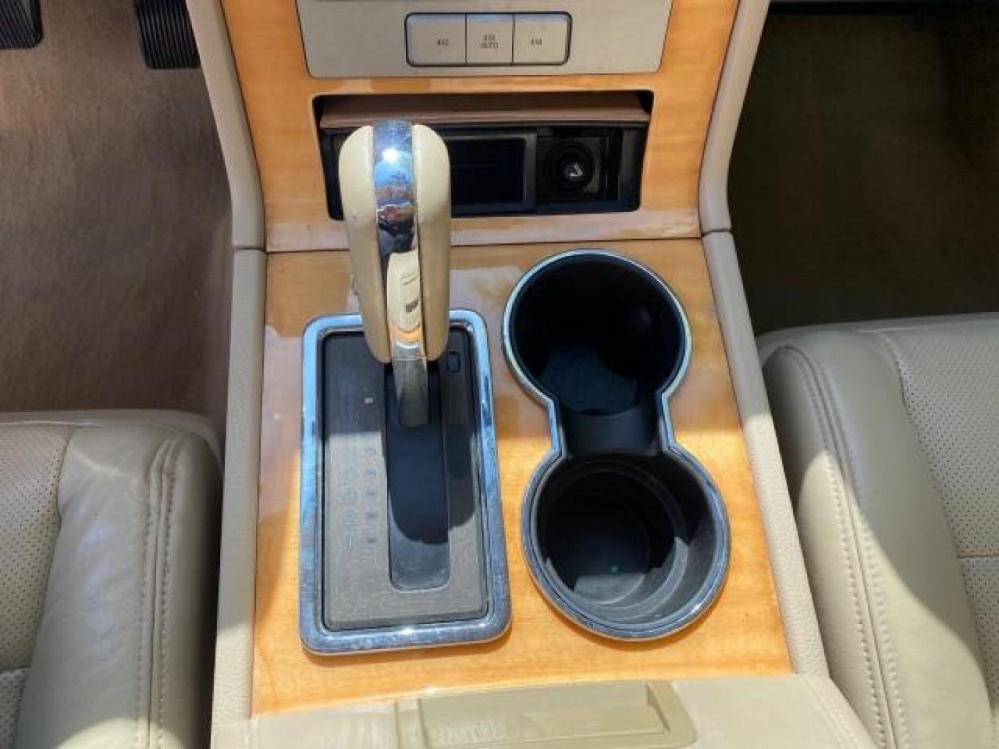 2010 White Platinum Tri-Coat Metallic /Camel Lincoln Navigator 4WD SUNROOF LOW MILES 31,209 (5LMJJ2J50AE) with an 5.4L SOHC 24-Valve V8 FFV Engine engine, Automatic transmission, located at 4701 North Dixie Hwy, Pompano Beach, FL, 33064, (954) 422-2889, 26.240938, -80.123474 - OUR WEBPAGE FLORIDACARS1.COM HAS OVER 100 PHOTOS AND FREE CARFAX LINK 2010 Lincoln Navigator 4 Door Wagon/Sport Utility 5.4L V8 F SOHC 24V Flex Fuel 18 MPG Rear Wheel Drive w/ 4X4 Features 20 Inch Plus Wheels 4WD/AWD A/C Seat(s) ABS Brakes Air Conditioning Alloy Wheels AM/FM Stereo Automatic Transmi- Photo#62