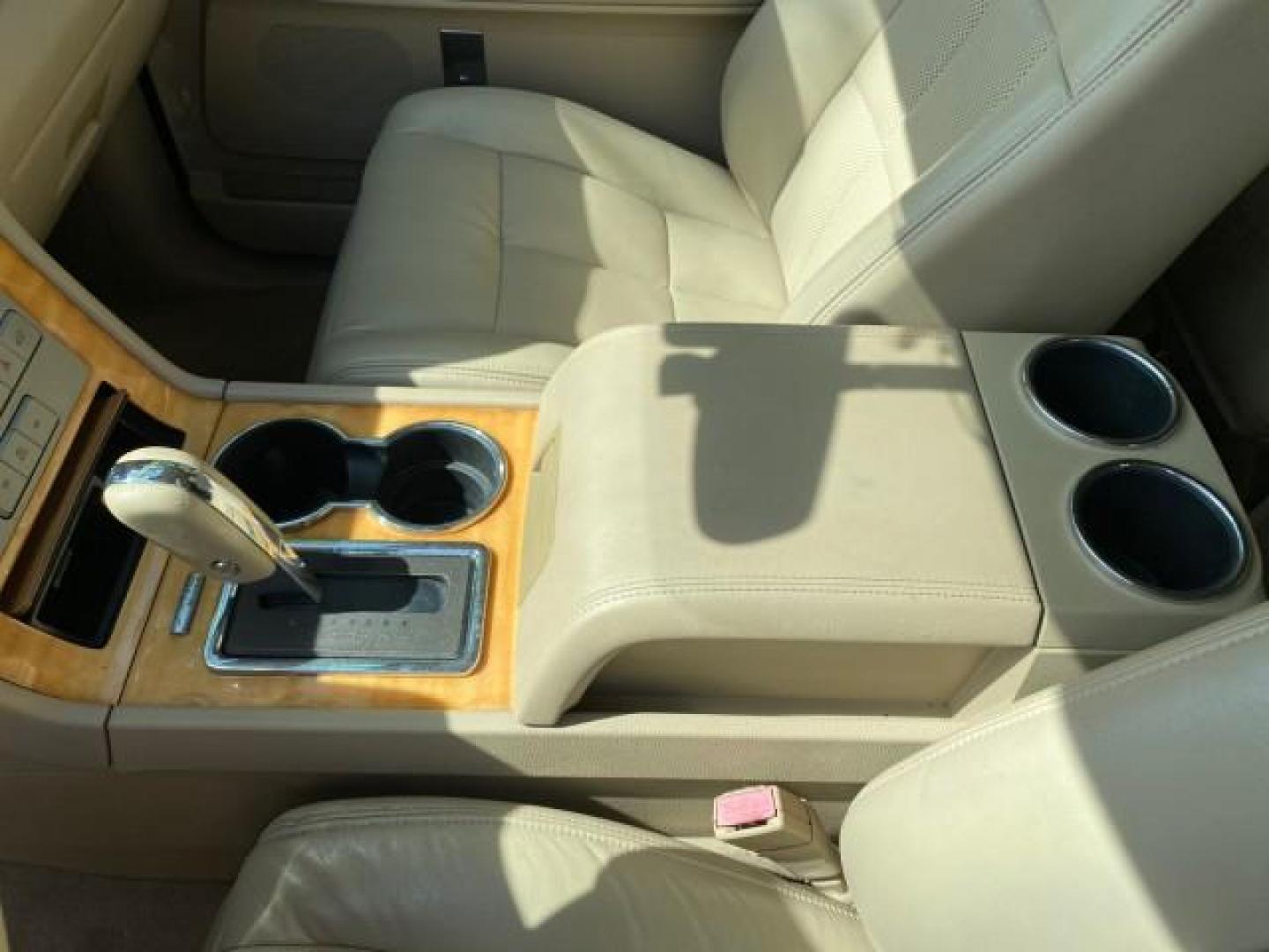 2010 White Platinum Tri-Coat Metallic /Camel Lincoln Navigator 4WD SUNROOF LOW MILES 31,209 (5LMJJ2J50AE) with an 5.4L SOHC 24-Valve V8 FFV Engine engine, Automatic transmission, located at 4701 North Dixie Hwy, Pompano Beach, FL, 33064, (954) 422-2889, 26.240938, -80.123474 - OUR WEBPAGE FLORIDACARS1.COM HAS OVER 100 PHOTOS AND FREE CARFAX LINK 2010 Lincoln Navigator 4 Door Wagon/Sport Utility 5.4L V8 F SOHC 24V Flex Fuel 18 MPG Rear Wheel Drive w/ 4X4 Features 20 Inch Plus Wheels 4WD/AWD A/C Seat(s) ABS Brakes Air Conditioning Alloy Wheels AM/FM Stereo Automatic Transmi- Photo#63