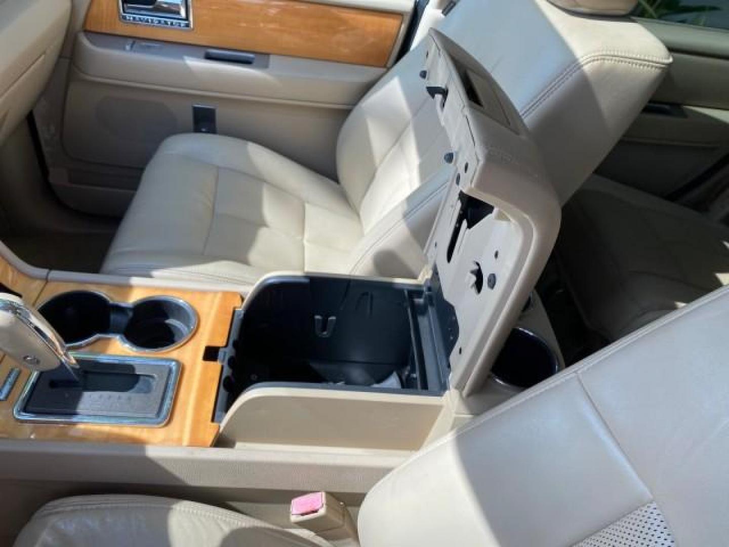 2010 White Platinum Tri-Coat Metallic /Camel Lincoln Navigator 4WD SUNROOF LOW MILES 31,209 (5LMJJ2J50AE) with an 5.4L SOHC 24-Valve V8 FFV Engine engine, Automatic transmission, located at 4701 North Dixie Hwy, Pompano Beach, FL, 33064, (954) 422-2889, 26.240938, -80.123474 - OUR WEBPAGE FLORIDACARS1.COM HAS OVER 100 PHOTOS AND FREE CARFAX LINK 2010 Lincoln Navigator 4 Door Wagon/Sport Utility 5.4L V8 F SOHC 24V Flex Fuel 18 MPG Rear Wheel Drive w/ 4X4 Features 20 Inch Plus Wheels 4WD/AWD A/C Seat(s) ABS Brakes Air Conditioning Alloy Wheels AM/FM Stereo Automatic Transmi- Photo#65