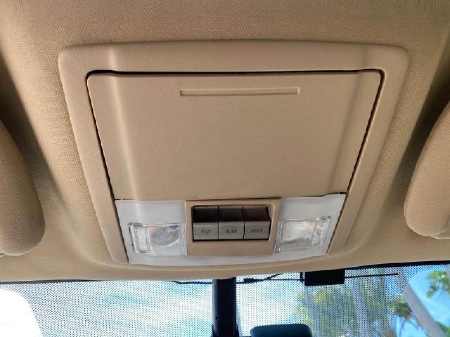 2010 White Platinum Tri-Coat Metallic /Camel Lincoln Navigator 4WD SUNROOF LOW MILES 31,209 (5LMJJ2J50AE) with an 5.4L SOHC 24-Valve V8 FFV Engine engine, Automatic transmission, located at 4701 North Dixie Hwy, Pompano Beach, FL, 33064, (954) 422-2889, 26.240938, -80.123474 - OUR WEBPAGE FLORIDACARS1.COM HAS OVER 100 PHOTOS AND FREE CARFAX LINK 2010 Lincoln Navigator 4 Door Wagon/Sport Utility 5.4L V8 F SOHC 24V Flex Fuel 18 MPG Rear Wheel Drive w/ 4X4 Features 20 Inch Plus Wheels 4WD/AWD A/C Seat(s) ABS Brakes Air Conditioning Alloy Wheels AM/FM Stereo Automatic Transmi- Photo#71