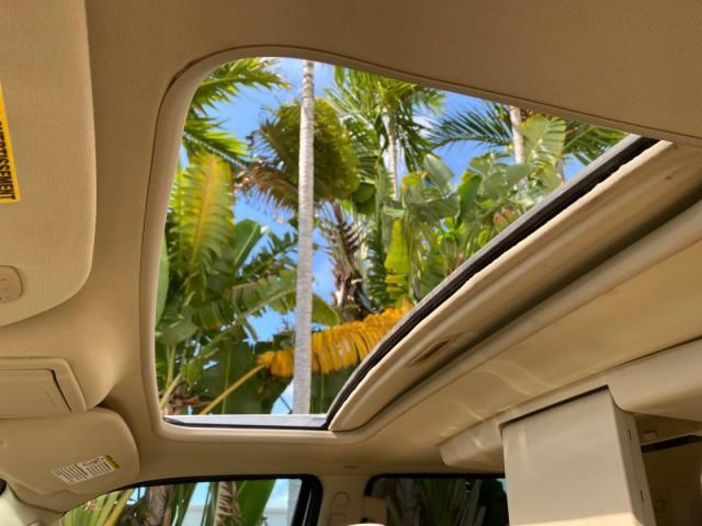 2010 White Platinum Tri-Coat Metallic /Camel Lincoln Navigator 4WD SUNROOF LOW MILES 31,209 (5LMJJ2J50AE) with an 5.4L SOHC 24-Valve V8 FFV Engine engine, Automatic transmission, located at 4701 North Dixie Hwy, Pompano Beach, FL, 33064, (954) 422-2889, 26.240938, -80.123474 - OUR WEBPAGE FLORIDACARS1.COM HAS OVER 100 PHOTOS AND FREE CARFAX LINK 2010 Lincoln Navigator 4 Door Wagon/Sport Utility 5.4L V8 F SOHC 24V Flex Fuel 18 MPG Rear Wheel Drive w/ 4X4 Features 20 Inch Plus Wheels 4WD/AWD A/C Seat(s) ABS Brakes Air Conditioning Alloy Wheels AM/FM Stereo Automatic Transmi- Photo#73