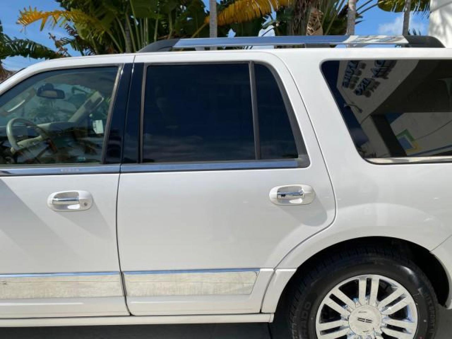 2010 White Platinum Tri-Coat Metallic /Camel Lincoln Navigator 4WD SUNROOF LOW MILES 31,209 (5LMJJ2J50AE) with an 5.4L SOHC 24-Valve V8 FFV Engine engine, Automatic transmission, located at 4701 North Dixie Hwy, Pompano Beach, FL, 33064, (954) 422-2889, 26.240938, -80.123474 - OUR WEBPAGE FLORIDACARS1.COM HAS OVER 100 PHOTOS AND FREE CARFAX LINK 2010 Lincoln Navigator 4 Door Wagon/Sport Utility 5.4L V8 F SOHC 24V Flex Fuel 18 MPG Rear Wheel Drive w/ 4X4 Features 20 Inch Plus Wheels 4WD/AWD A/C Seat(s) ABS Brakes Air Conditioning Alloy Wheels AM/FM Stereo Automatic Transmi- Photo#77