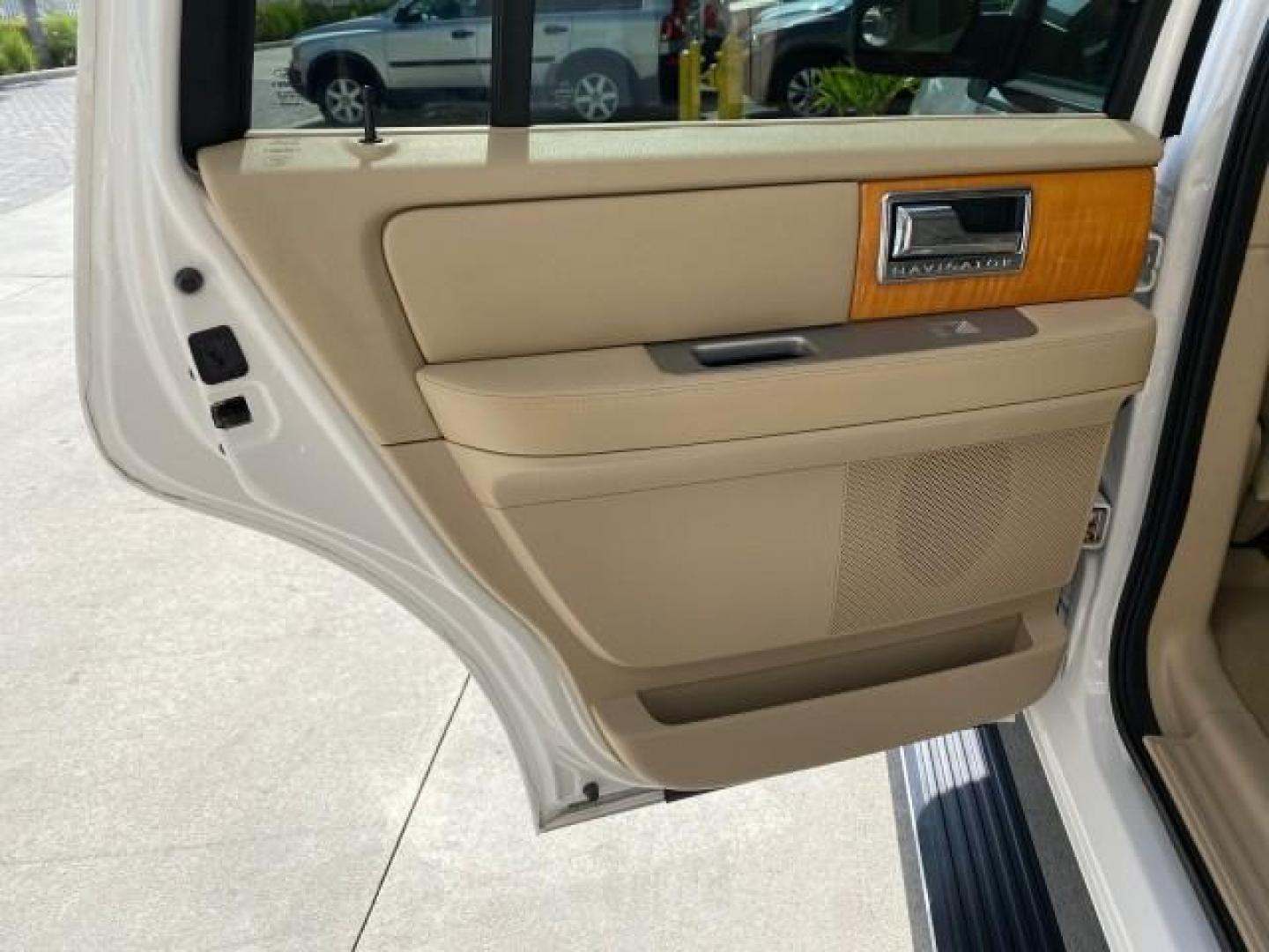 2010 White Platinum Tri-Coat Metallic /Camel Lincoln Navigator 4WD SUNROOF LOW MILES 31,209 (5LMJJ2J50AE) with an 5.4L SOHC 24-Valve V8 FFV Engine engine, Automatic transmission, located at 4701 North Dixie Hwy, Pompano Beach, FL, 33064, (954) 422-2889, 26.240938, -80.123474 - OUR WEBPAGE FLORIDACARS1.COM HAS OVER 100 PHOTOS AND FREE CARFAX LINK 2010 Lincoln Navigator 4 Door Wagon/Sport Utility 5.4L V8 F SOHC 24V Flex Fuel 18 MPG Rear Wheel Drive w/ 4X4 Features 20 Inch Plus Wheels 4WD/AWD A/C Seat(s) ABS Brakes Air Conditioning Alloy Wheels AM/FM Stereo Automatic Transmi- Photo#79